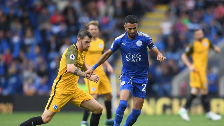LEICESTER, ENGLAND - AUGUST 19: Riyad Mahrez of Leicester City and Pascal Grob of Brighton and Hove Albion  during the Premier League match between Leicest