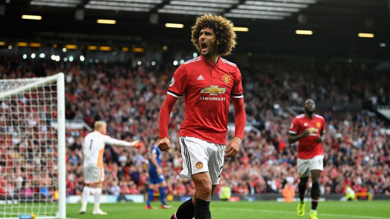 Marouane Fellaini celebrates after coming on and scoring a second for Manchester United