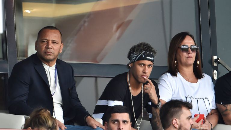 Neymar in the stands with his father Neymar Santos, Sr and mother Nadine Santos during the Ligue 1 match between PSG and Amiens