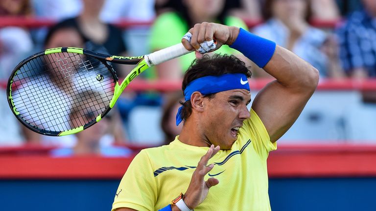 MONTREAL, QC - AUGUST 09:  Rafael Nadal of Spain hits a return against Borna Coric of Croatia during day six of the Rogers Cup presented by National Bank a