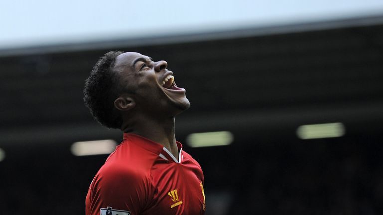 Liverpool's English midfielder Raheem Sterling celebrates scoring their fifth goal during the English Premier League football match between Liverpool and A