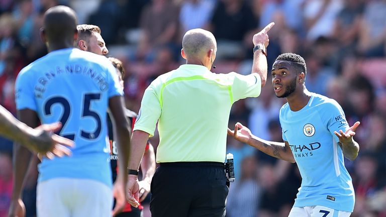 Raheem Sterling is sent off by referee Mike Dean after receiving a second yellow card