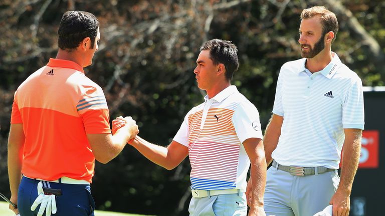 Jon Rahm (L) partnered Fowler and Johnson for the opening two rounds