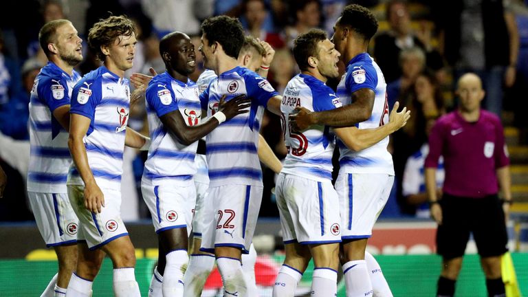Reading's Modou Barrow (third left) is congratulated by team mates after scoring his side's second goal during the Sky Bet Championship match 