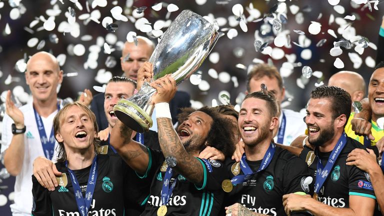 Real Madrid celebrate with the UEFA Super Cup