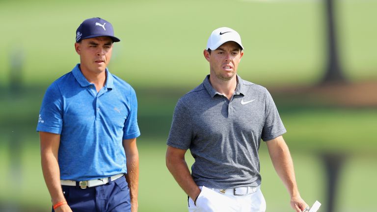 CHARLOTTE, NC - AUGUST 11:  Rickie Fowler of the United States and Rory McIlroy of Northern Ireland walk onto the 16th green during the second round of the