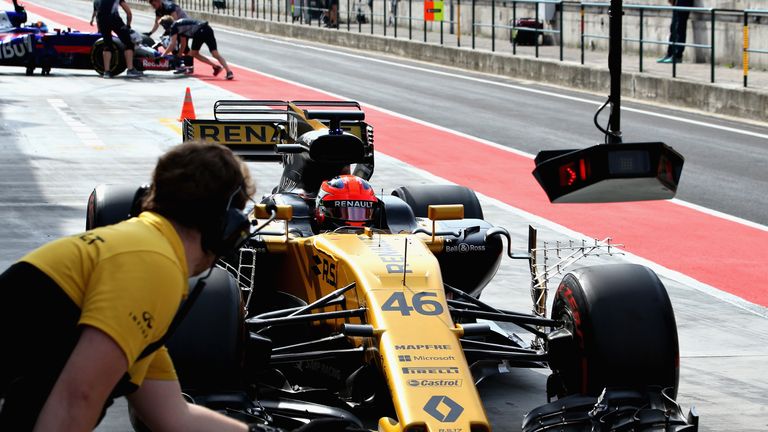 BUDAPEST, HUNGARY - AUGUST 02:  Robert Kubica driving the (46) Renault Sport Formula One Team Renault RS17 in the Pitlane during day two of F1 in season te