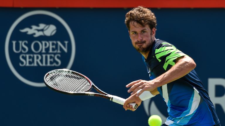 MONTREAL, QC - AUGUST 11:  Robin Haase of Netherlands prepares to hit a return against Diego Schwartzman of Argentina during day eight of the Rogers Cup pr