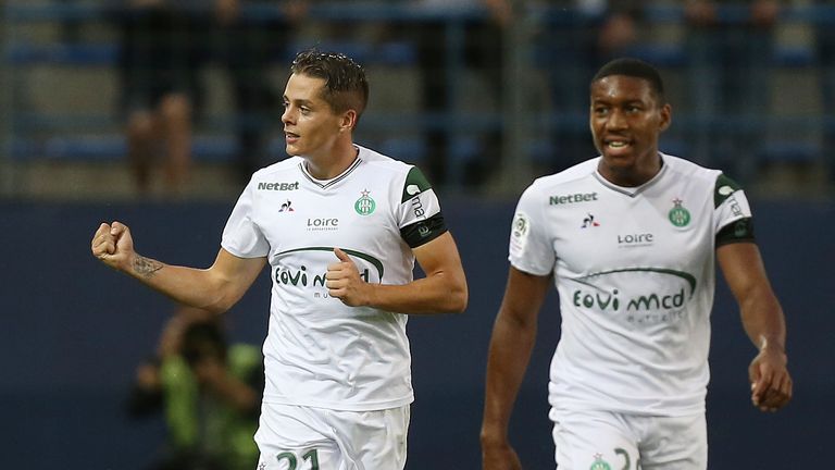 Saint-Etienne's French midfielder Romain Hamouma (L) celebrates with team-mates after scoring against Caen