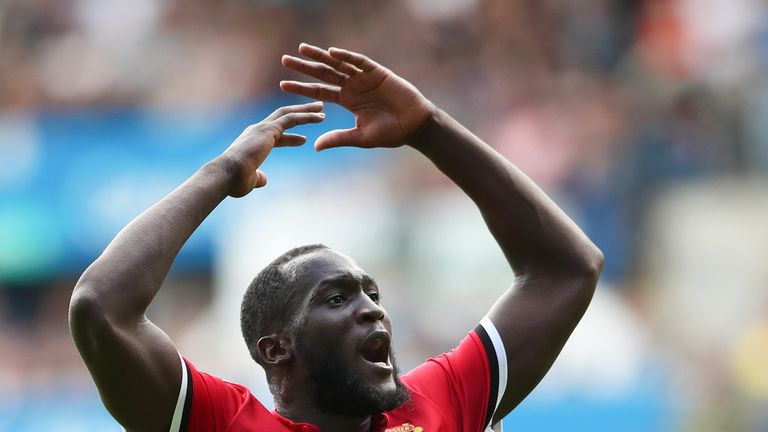 Romelu Lukaku celebrates as Anthony Martial adds a fourth for Manchester United