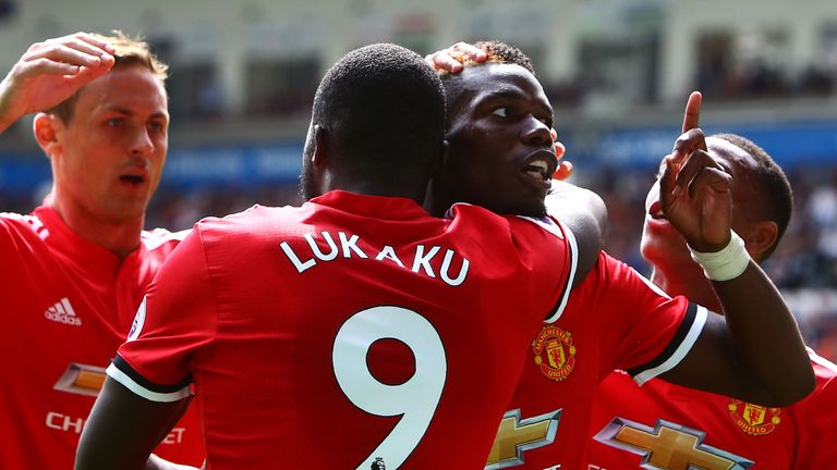 Paul Pogba celebrates with Romelu Lukaku during Manchester United's 4-0 win at Swansea