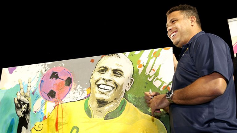 Former Brazilian World Cup star Ronaldo Nazario is pictured after signing a poster with his likeness during a ceremony naming him as Walt Disney World's 20