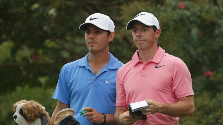 CHARLOTTE, NC - AUGUST 07: Rory McIlroy of Northern Ireland talks with caddie Harry Diamond (L) during a practice round prior to the 2017 PGA Championship 