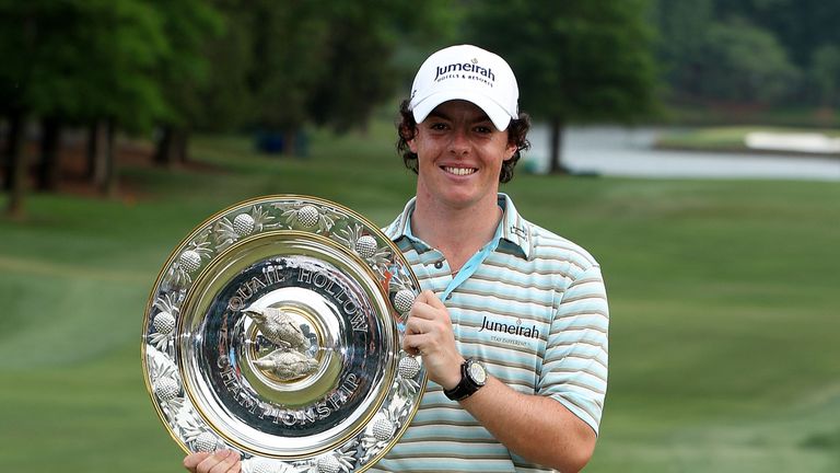 CHARLOTTE, NC - MAY 02:  Rory McIlroy of Northern Ireland poses with the winner's trophy after his four-stroke victory at the 2010 Quail Hollow Championshi