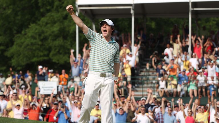 CHARLOTTE, NC - MAY 02:  Rory McIlroy of Northern Ireland celebrates as he holes a birdie putt on the 18th green to secure victory during the final round o