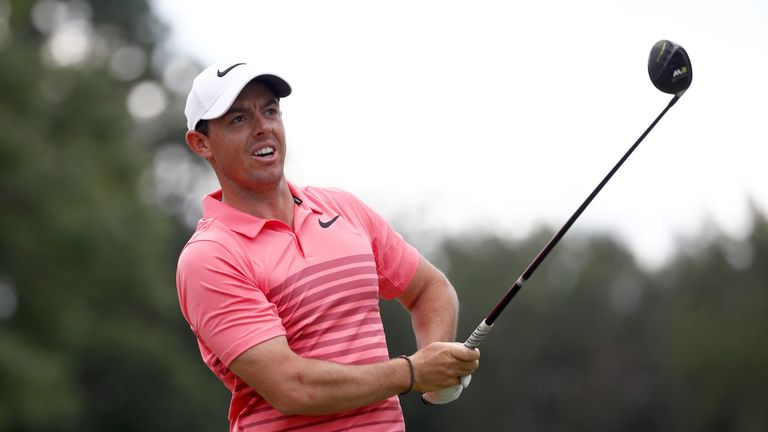 Rory McIlroy of Northern Ireland hits off the third tee during the third round of the World Golf Championships - Bridgestone Invitational