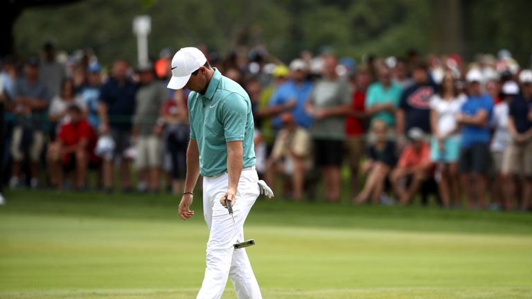 AKRON, OH - AUGUST 06:  Rory McIlroy of Northern Ireland reacts after a putt on the eighth green during the final round of the World Golf Championships - B