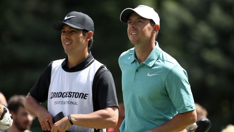 AKRON, OH - AUGUST 06:  Rory McIlroy of Northern Ireland and caddie Harry Diamond look on from the seventh tee during the final round of the World Golf Cha