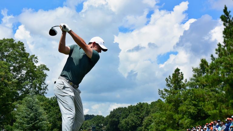 Rory McIlroy tees off on the third hole at Quail Hollow