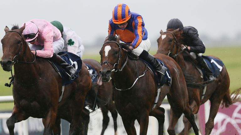 Rostropovich ridden by Ryan Moore (centre) on his way to winning the Galileo Irish EBF Futurity Stakes at Curragh Racecourse. PRESS ASSOCIATION Photo. Pict