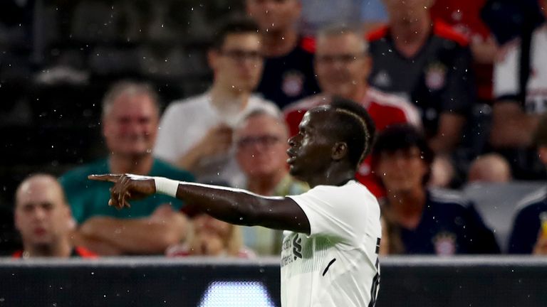 Sadio Mane celebrates after opening the scoring for Liverpool