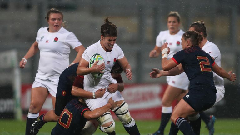 BELFAST, NORTHERN IRELAND - AUGUST 22:  Sarah Hunter of England is hauled down by the French defence during the Women's Rugby World Cup 2017 Semi Final mat