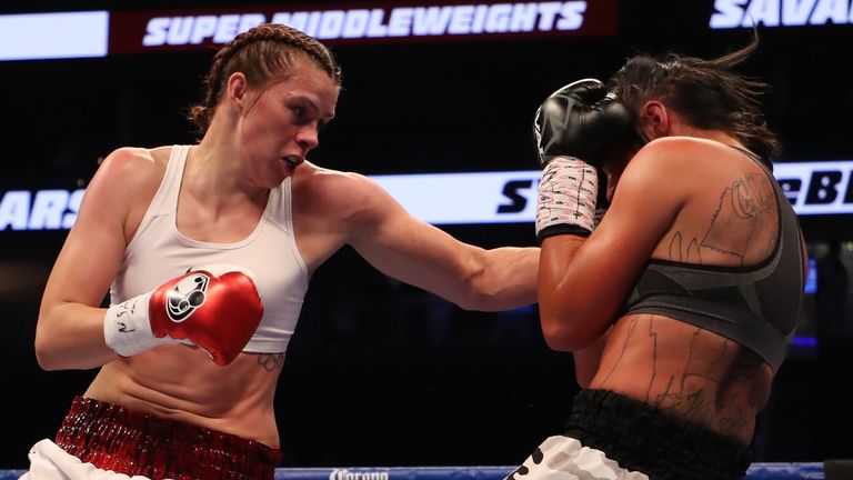 Savannah Marshall throws a punch at Sydney LeBlanc during their super middleweight bout on August 26, 2017 at T-Mobile Arena.