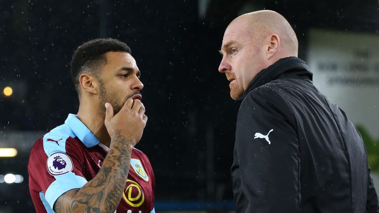Sean Dyche, Manager of Burnley speaks with Andre Gray