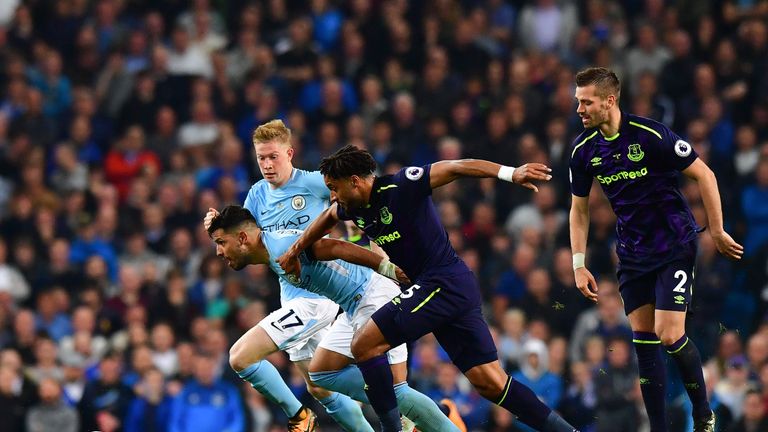 Sergio Aguero leads the chase for a loose ball during the Premier League match between Manchester City and Everton