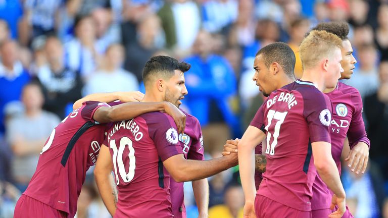Manchester City's Sergio Aguero (centre) celebrates scoring his side's first goal