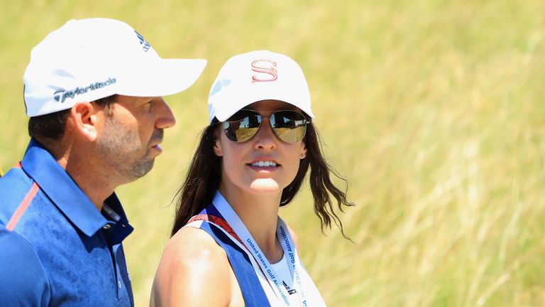 HARTFORD, WI - JUNE 16:  Sergio Garcia of Spain and fiancée Angela Akins walk off the course during the second round of the 2017 U.S. Open at Erin Hills o