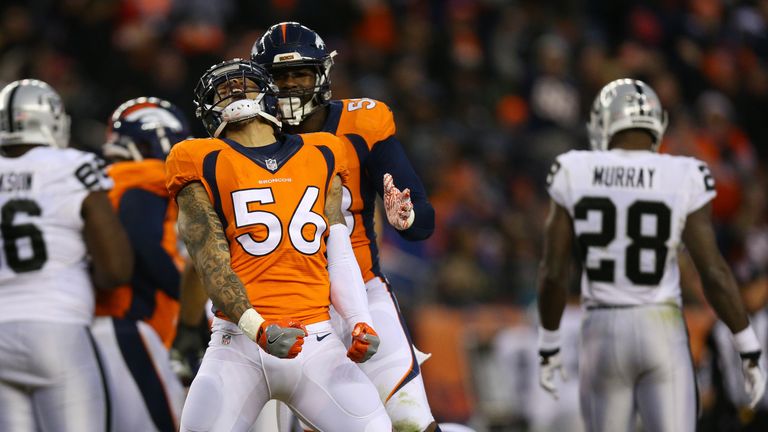 DENVER, CO - JANUARY 1:  Outside linebacker Shane Ray #56 of the Denver Broncos and outside linebacker Von Miller #58 celebrate a strip fumble in the fourt