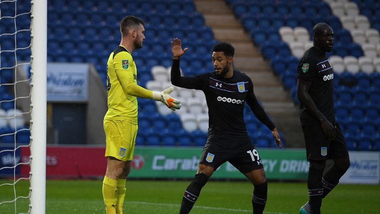 COLCHESTER, ENGLAND - AUGUST 09:  Aston Villa goalkeeper Jed Steer celebrates with Andre Green after saving a penalty during the Carabao Cup First Round ma
