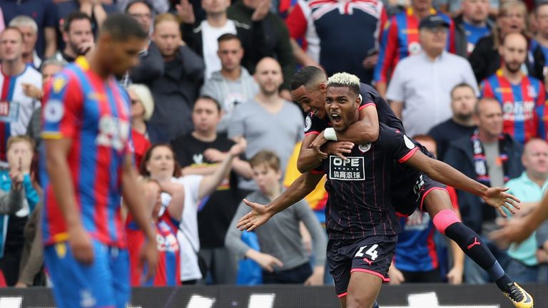 LONDON, ENGLAND - AUGUST 12:  Steve Mounie of Huddersfield Town celebrates scoring his sides second goal during the Premier League match between Crystal Pa