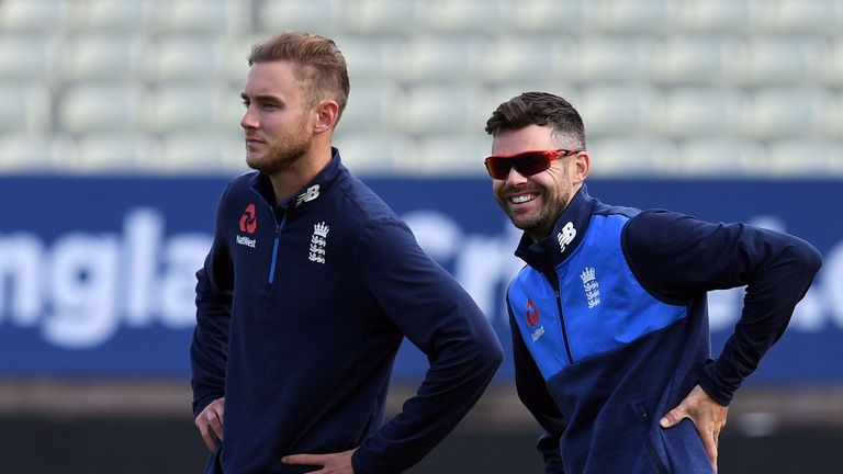 England's Stuart Broad (L) and England's James Anderson attend a training session on the eve of the first day of the first Test Match