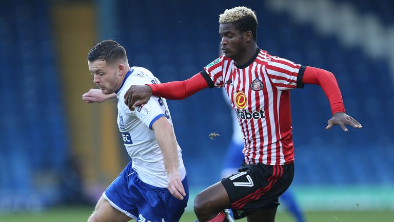 Bury's Harry Bunn and Sunderland's Didier N'Dong during the Carabao Cup, First Round match at Gigg Lane, Bury.