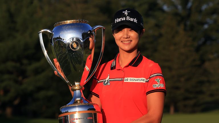 Sung Hyun Park of Korea celebrates with the trophy after winning the Canadian Pacific Women's Open following the final round 