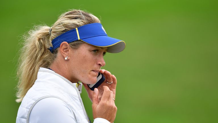 Suzann Pettersen of Team Europe talks on he phone during practice for The Solheim Cup at the Des Moines Country Club on 
