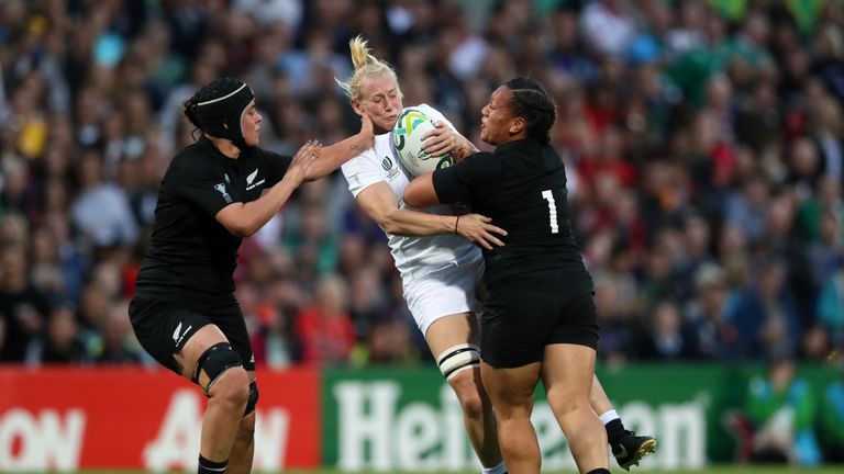 England's Tamara Taylor is tackled by New Zealand's Toka Natua (right) and Eloise Blackwell