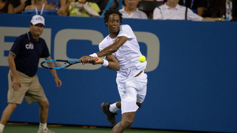 Gael Monfils of France competes with Yuki Bhambri of India at William H.G. FitzGerald Tennis Center