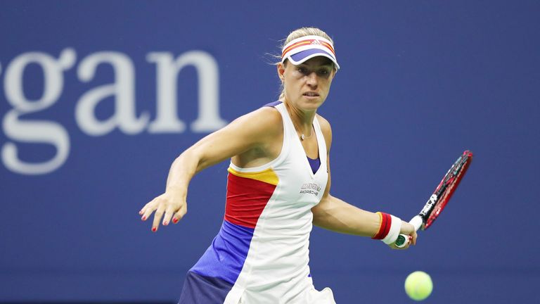Angelique Kerber of Germany returns a shot to Naomi Osaka of Japan on Day Two of the 2017 US Open