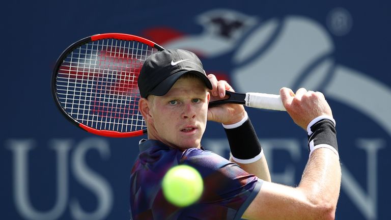 Kyle Edmund of Great Britain returns a shot during his first round Men's Singles match against Robin Haase of the Netherlands