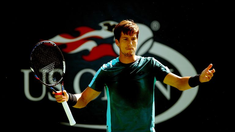 Aljaz Bedene of Great Britain reacts against Andrey Rublev of Russia during their first round Men's Singles match on Day Three of the US Open