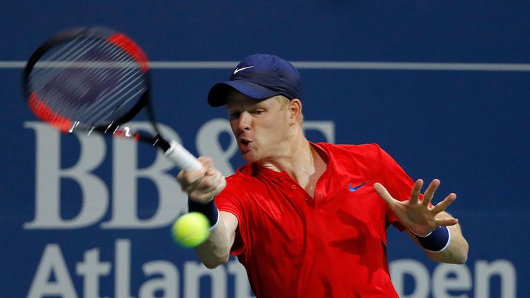 Kyle Edmund of Great Britain returns a forehand to Ryan Harrison during the BB&T Atlanta Open at Atlantic Station