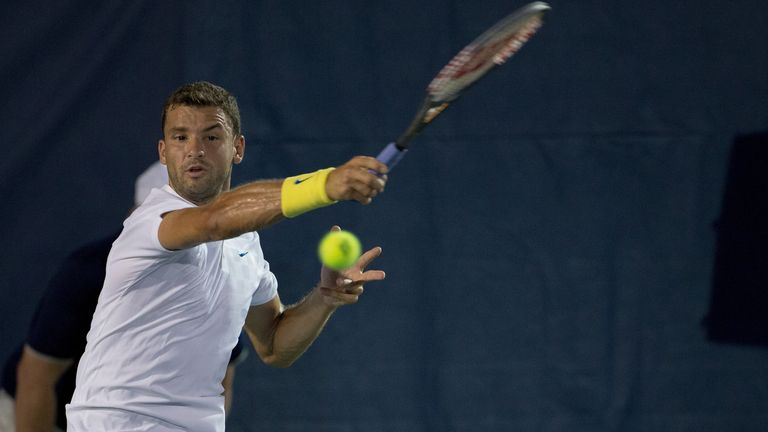 Grigor Dimitrov of Bulgaria competes with Kyle Edmund of South Africa at William H.G. FitzGerald Tennis Center