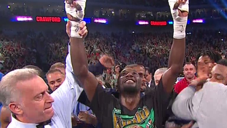Terence Crawford celebrates after becoming the undisputed champion with victory over Julius Indongo