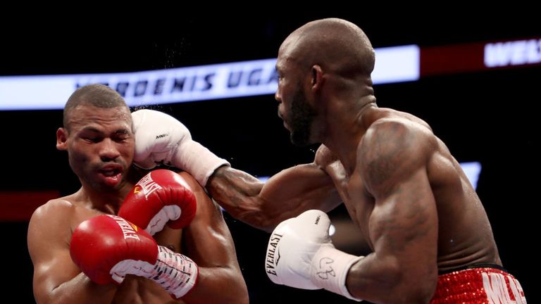 Yordenis Ugas connects with a right at Thomas Dulorme during their welterweight bout on August 26, 2017 at T-Mobile Arena