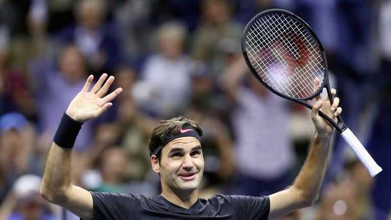 Roger Federer celebrates his five-set victory over Frances Tiafoe