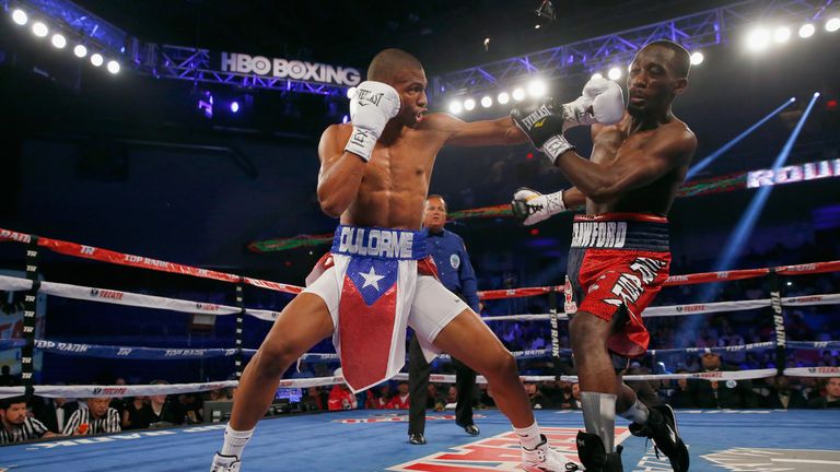 Terence Crawford takes on Thomas Dulorme of Puerto Rico in the first round in their WBO super-lightweight title fight.