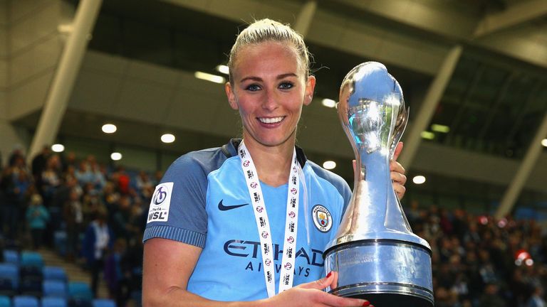 MANCHESTER, ENGLAND - OCTOBER 30:  Toni Duggan of Manchester City celebrates with the Women's Super Leage 1 trophy after the final whistle during Women's S